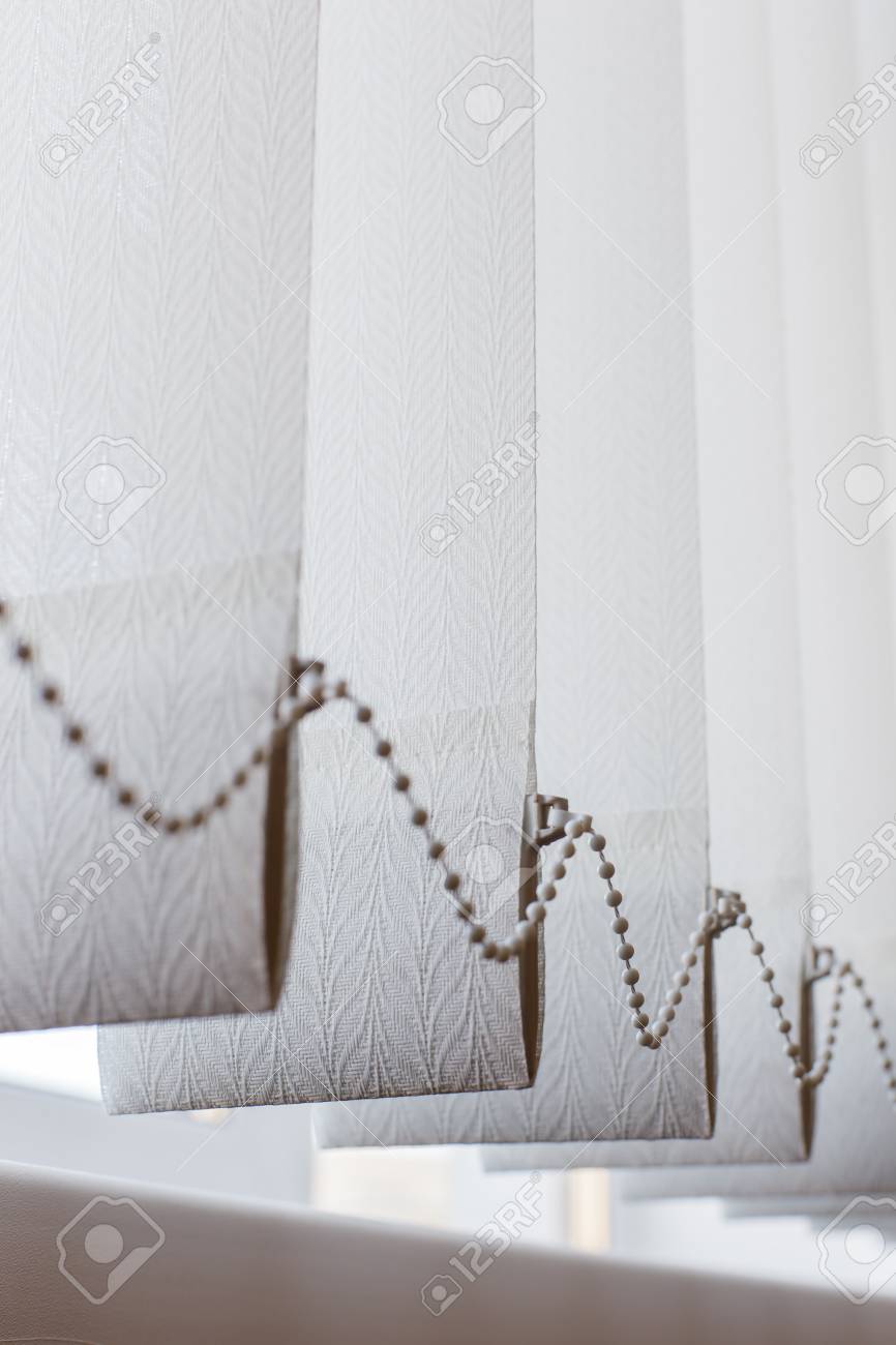 white vertical blinds long stock photo white vertical blinds with chain in the office vertical blinds with chain in the office white vertical blinds long stock photo white vertical blinds with chain in the office vertical blinds with chain in the office