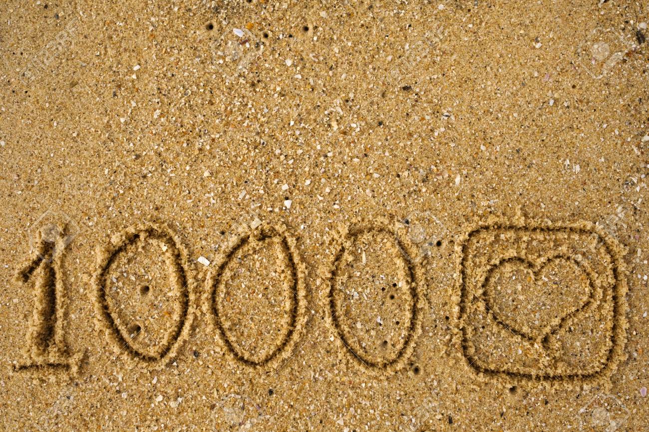 砂の上の絵のように1000時間のようなボタン ビデオブログでの成功 の写真素材 画像素材 Image