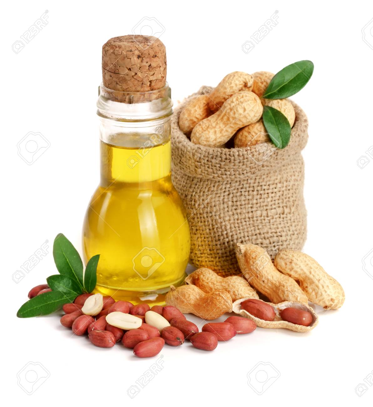 peanut oil in a glass bottle with peanuts in bag. - 88303182 peanut oil in a glass bottle with peanuts in bag. - 88303182