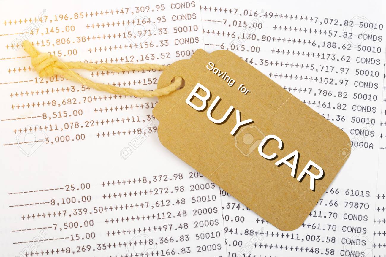 アカウント本背景で 紙タグを購入する車の文言に保存車金融お金の概念です の写真素材 画像素材 Image