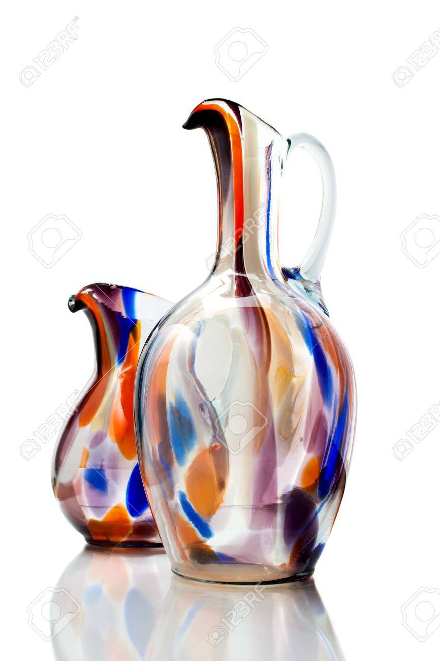 a couple of isolated colored glass vases on white background photo a couple of isolated colored glass vases on white background