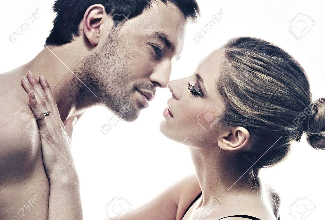 portrait of handsome couple gently kissing - 9467962 portrait of handsome couple gently kissing - 9467962