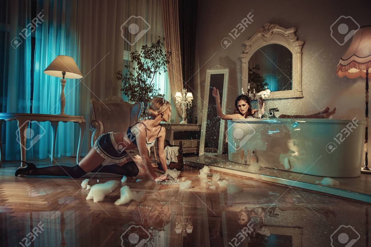 Conceptual picture of a customer yelling on a sensual maid - 73657588 Conceptual picture of a customer yelling on a sensual maid - 73657588