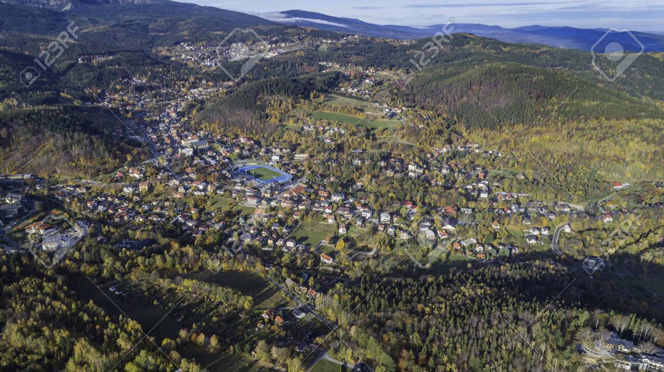 Aerial view of Karpacz city at the foot of Sniezka and the Karkonosze National Park - 141148716 Aerial view of Karpacz city at the foot of Sniezka and the Karkonosze National Park - 141148716