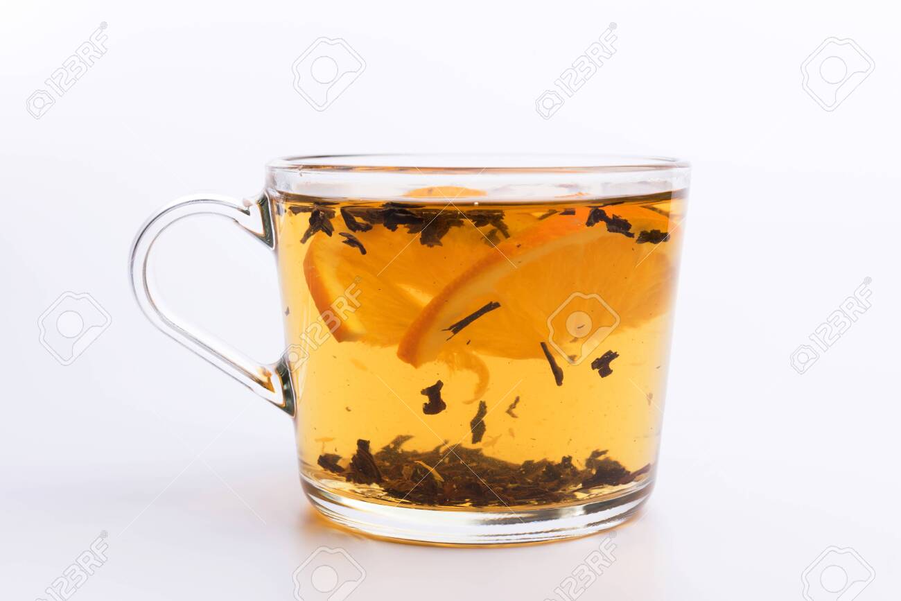 Glass cup of hot aromatic tea on white background - 121120300 Glass cup of hot aromatic tea on white background - 121120300