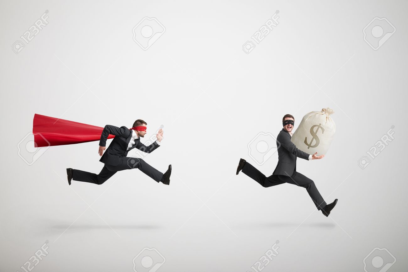 thief stole the bag with money and running away from superman over light grey background - 39632107 thief stole the bag with money and running away from superman over light grey background - 39632107
