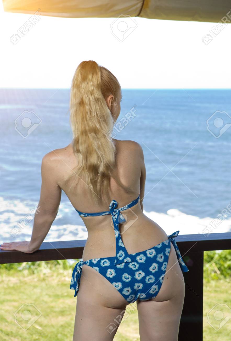 Onderbreking domineren Psychologisch Young Woman With A Slender Waist And Wide Hips In A Swimsuit Stand On A Terrace And Looks At The Sea Stock Photo, Picture And Royalty Free Image. Image 97040592. Onderbreking domineren Psychologisch Young Woman With A Slender Waist And Wide Hips In A Swimsuit Stand On A Terrace And Looks At The Sea Stock Photo, Picture And Royalty Free Image. Image 97040592.