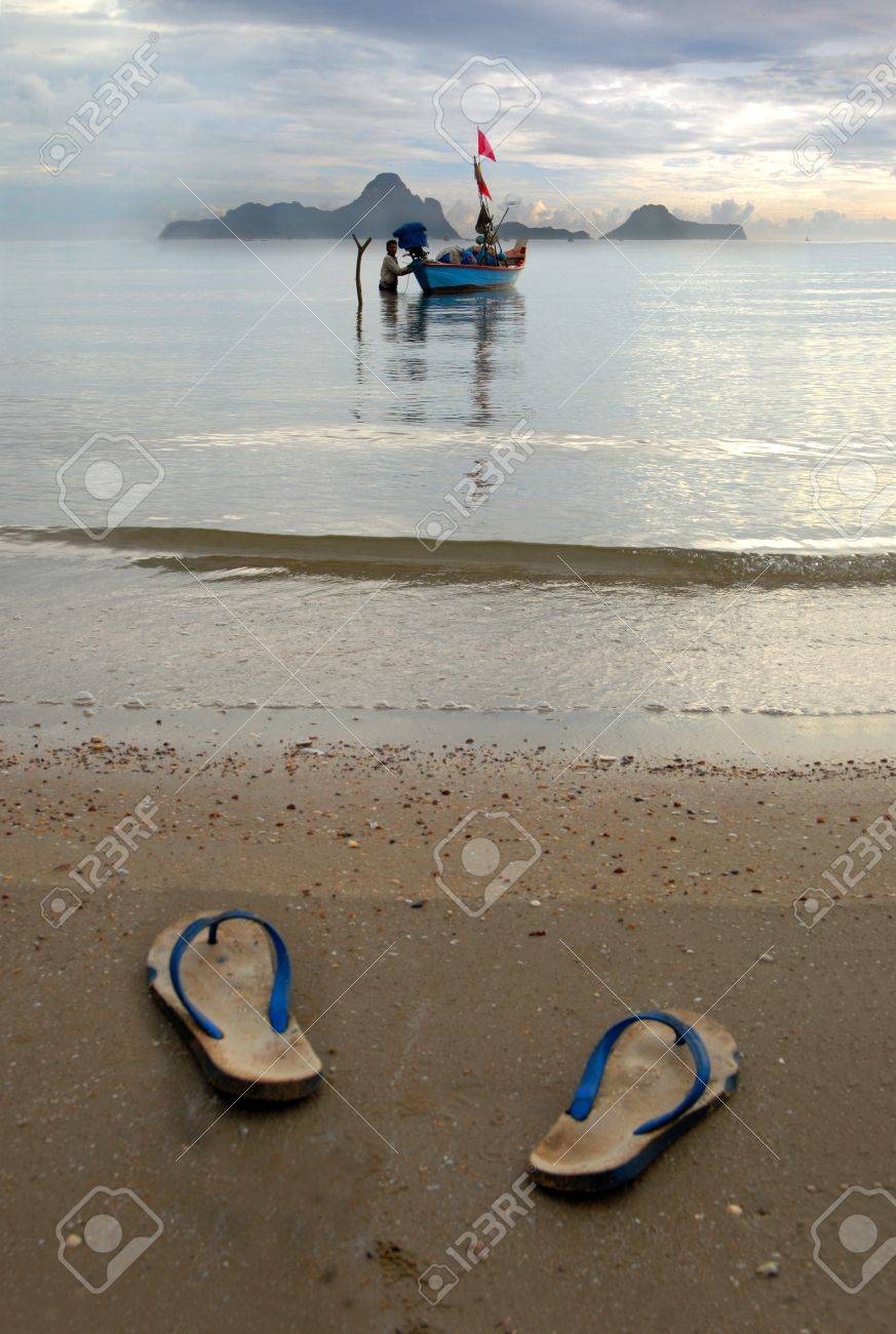 Slippers Of The Fisherman Thai Fishermen Off His On Beach Walk Barefooted To Slippers Of The Fisherman Thai Fishermen Off His On Beach Walk Barefooted To