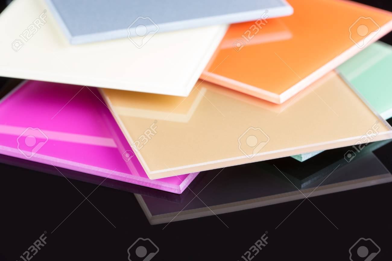 a stack of colored glass on a black background design glass sheets stock photo - Colored Glass Sheets a stack of colored glass on a black background design glass sheets stock photo - Colored Glass Sheets