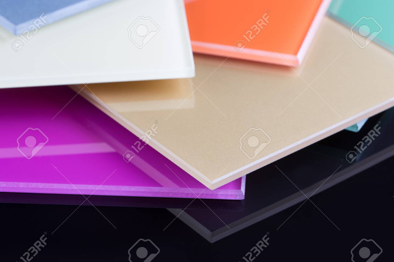 a stack of colored glass on a black background design glass sheets stock photo - Colored Glass Sheets a stack of colored glass on a black background design glass sheets stock photo - Colored Glass Sheets