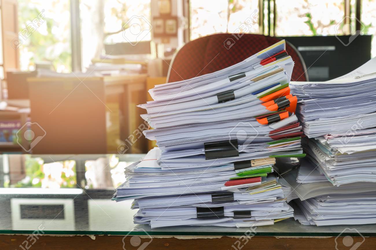 close up of business documents stack on desk report papers stock report papers