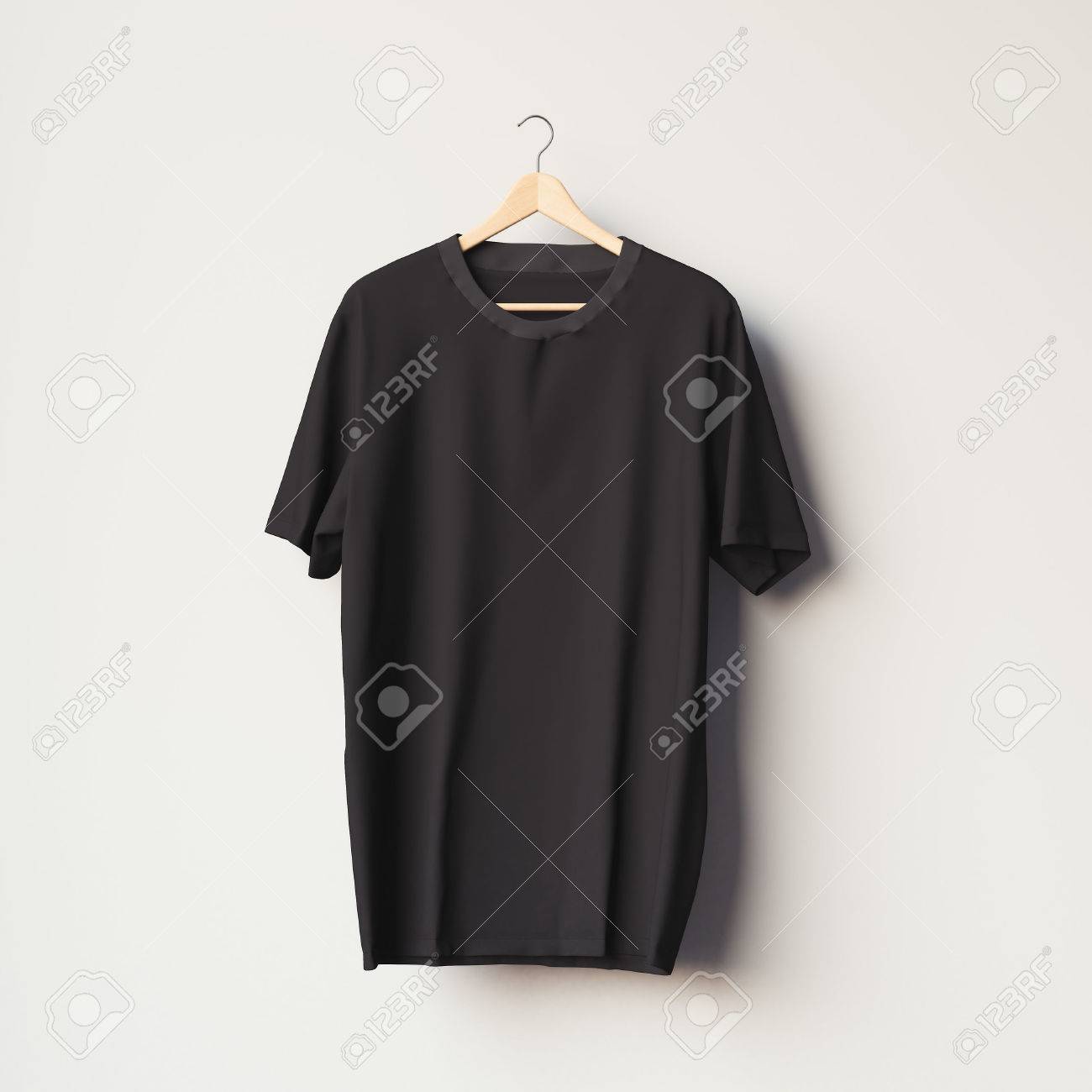 Black blank t-shirt on a wooden hanger in bright room. 3d rendering - 65750120 Black blank t-shirt on a wooden hanger in bright room. 3d rendering - 65750120