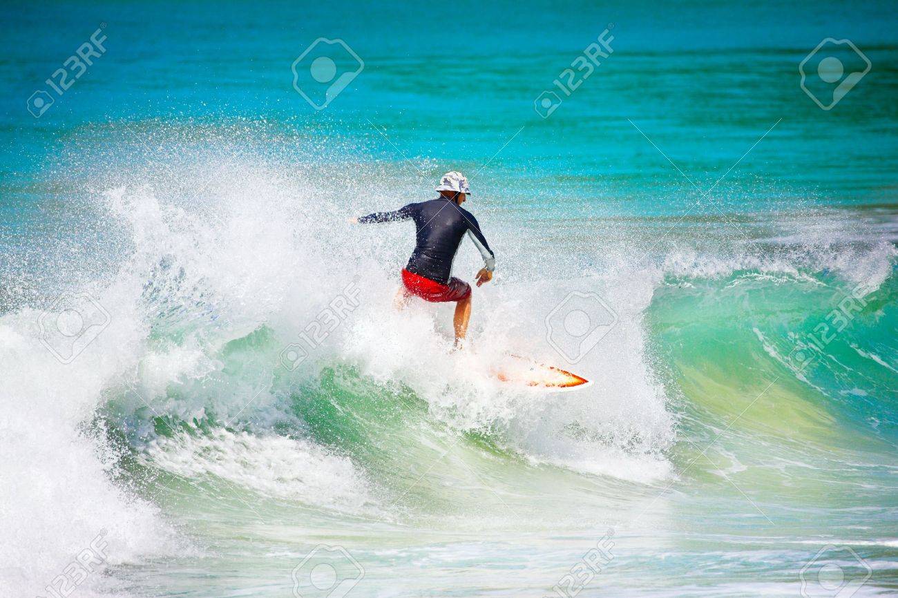 Man Surfed on Big Blue Ocean Wave - 11417836 Man Surfed on Big Blue Ocean Wave - 11417836