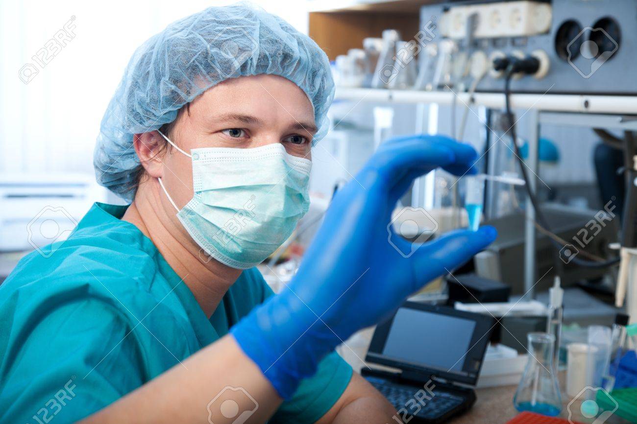 scientist doing DNA test in modern laboratory - 13578702 scientist doing DNA test in modern laboratory - 13578702