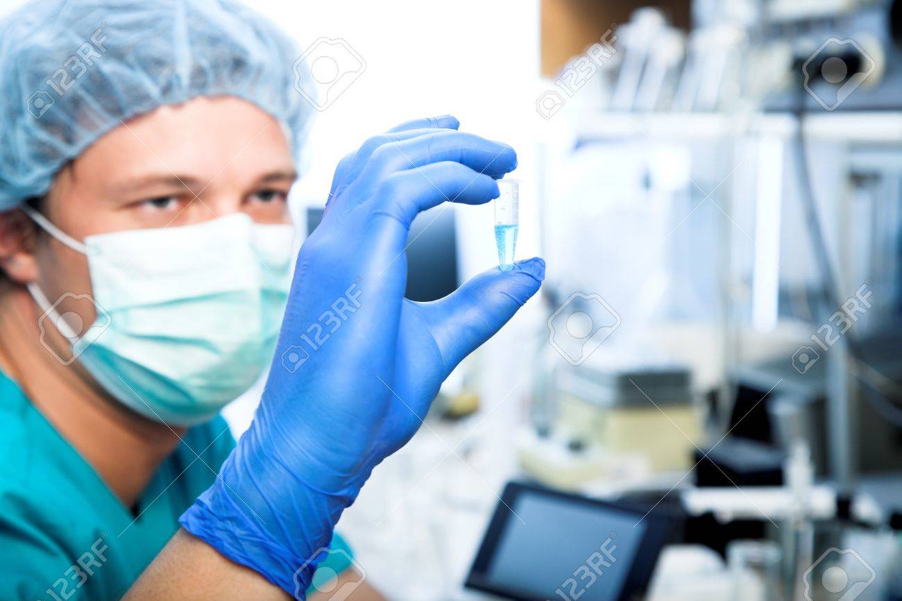 scientist doing DNA test in modern laboratory - 16334881 scientist doing DNA test in modern laboratory - 16334881