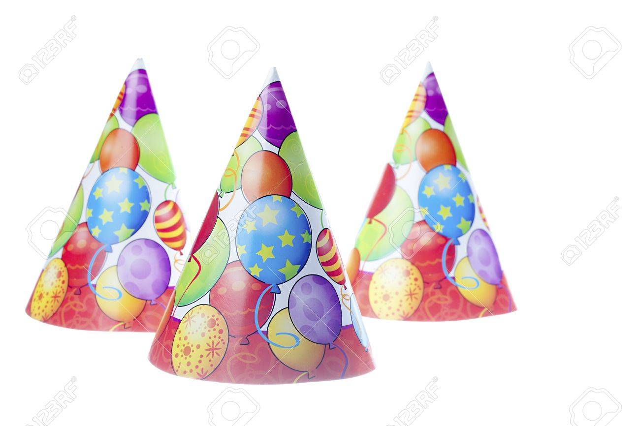 close up shot of three colorful birthday hats with balloons shape