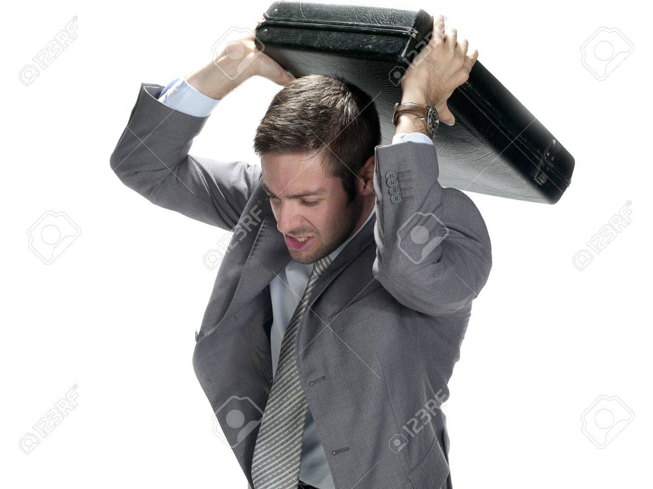 Junger Mann Wirft Einen Anfall Mit Einem Breifcase Uber Dem Kopf Lizenzfreie Fotos Bilder Und Stock Fotografie Image 17111675