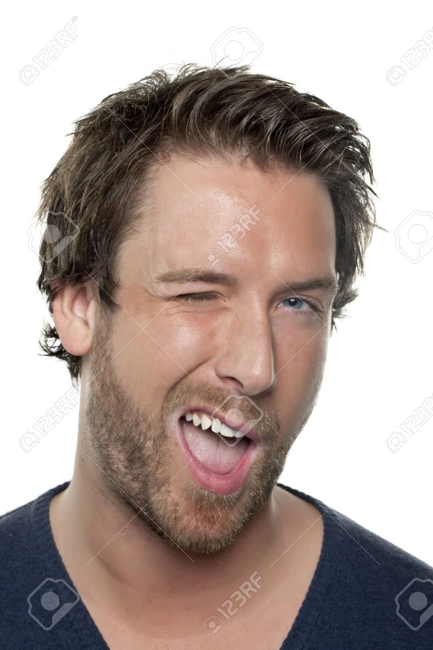 Head Shot Of A Winking Young Man Over A White Background Stock Photo,  Picture and Royalty Free Image. Image 17135209., image size:866x1300