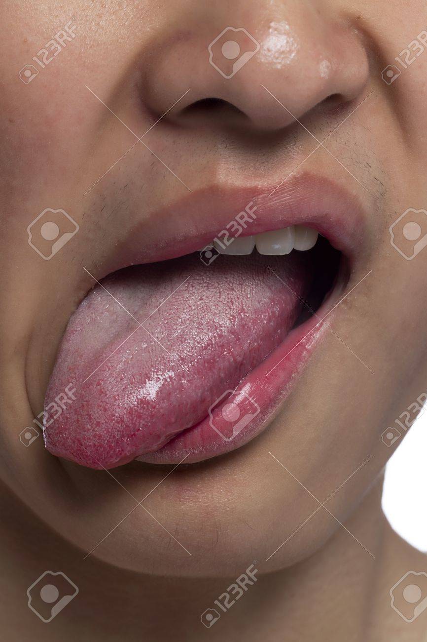 Close Up Image Of Guy Sticking Out His Tongue Stock Photo Picture And Royalty Free Image Image