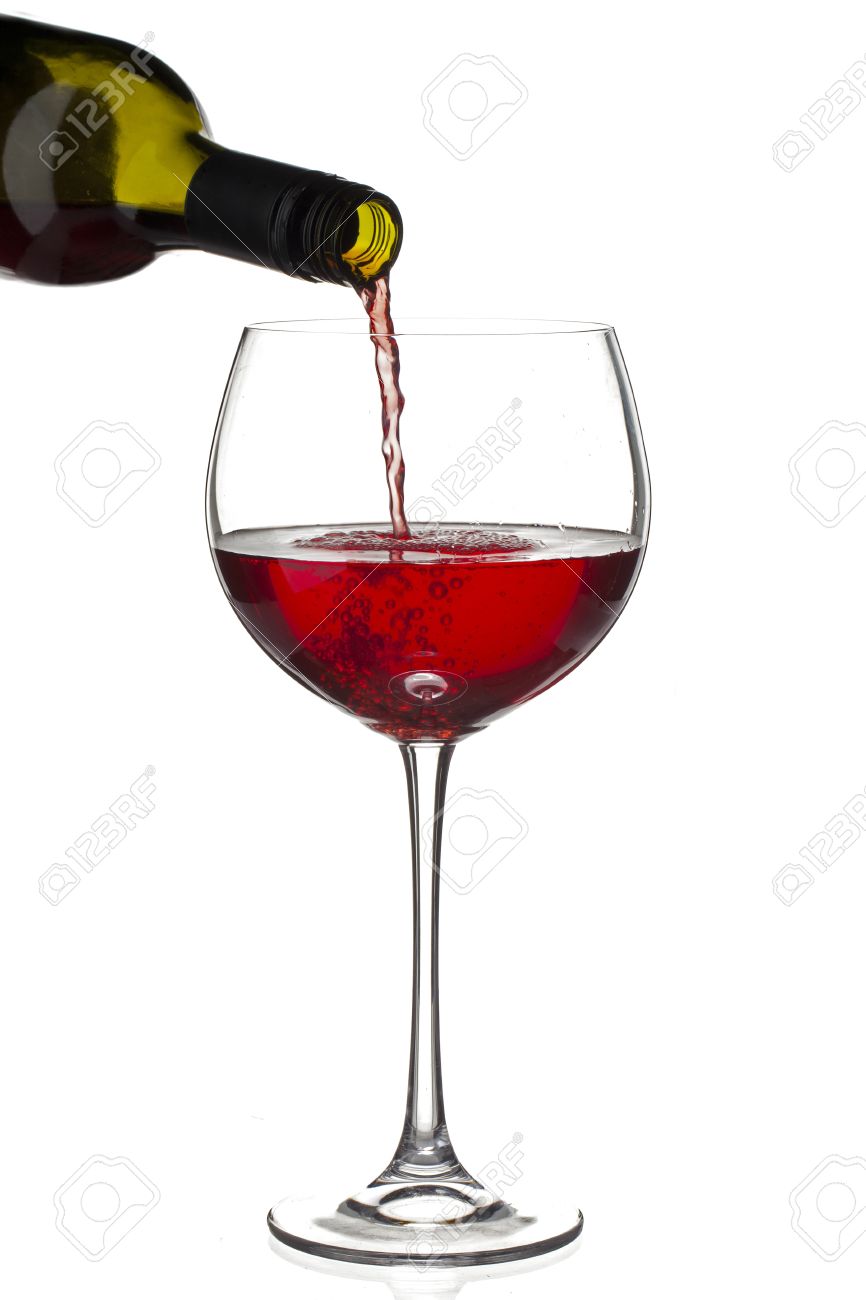 Close Up Shot Of Red Wine Bottle Pouring Wine In Wine Glass