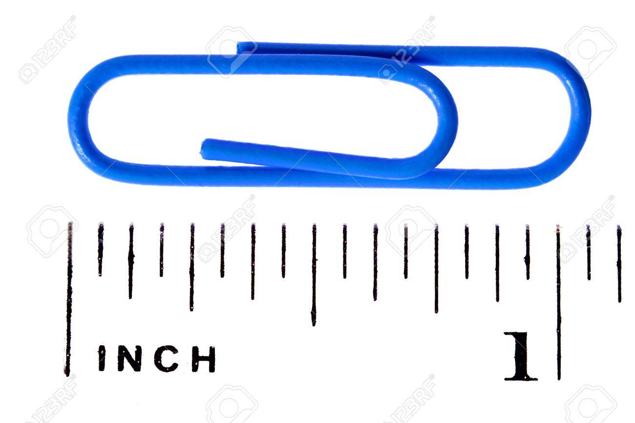 paper clip scale inch on white background stock photo picture and inch scale