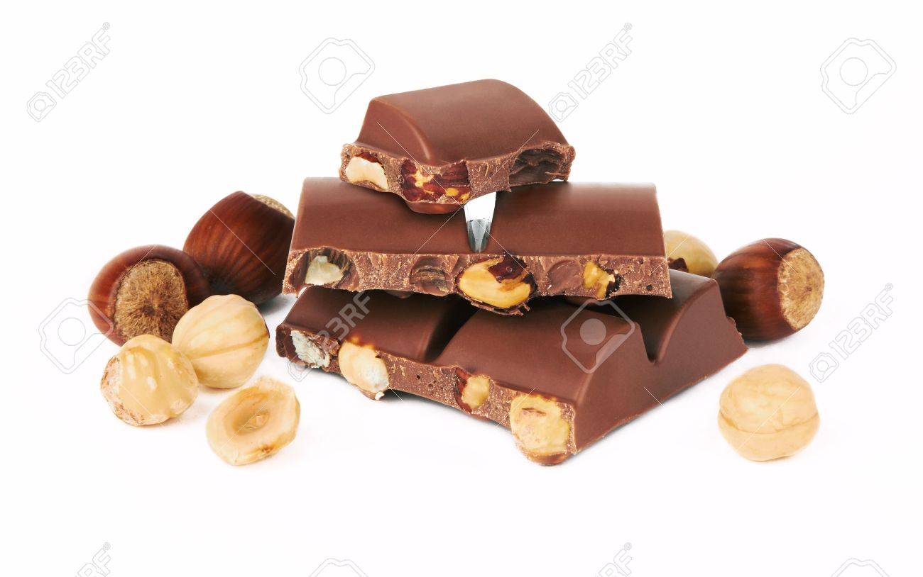 Chocolate with nuts on white background - 20192933 Chocolate with nuts on white background - 20192933