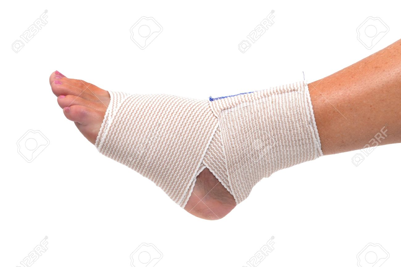 Ankle And Foot Wrapped In Bandage Stock Photo, Picture And Royalty Free Image. Image 14245095.