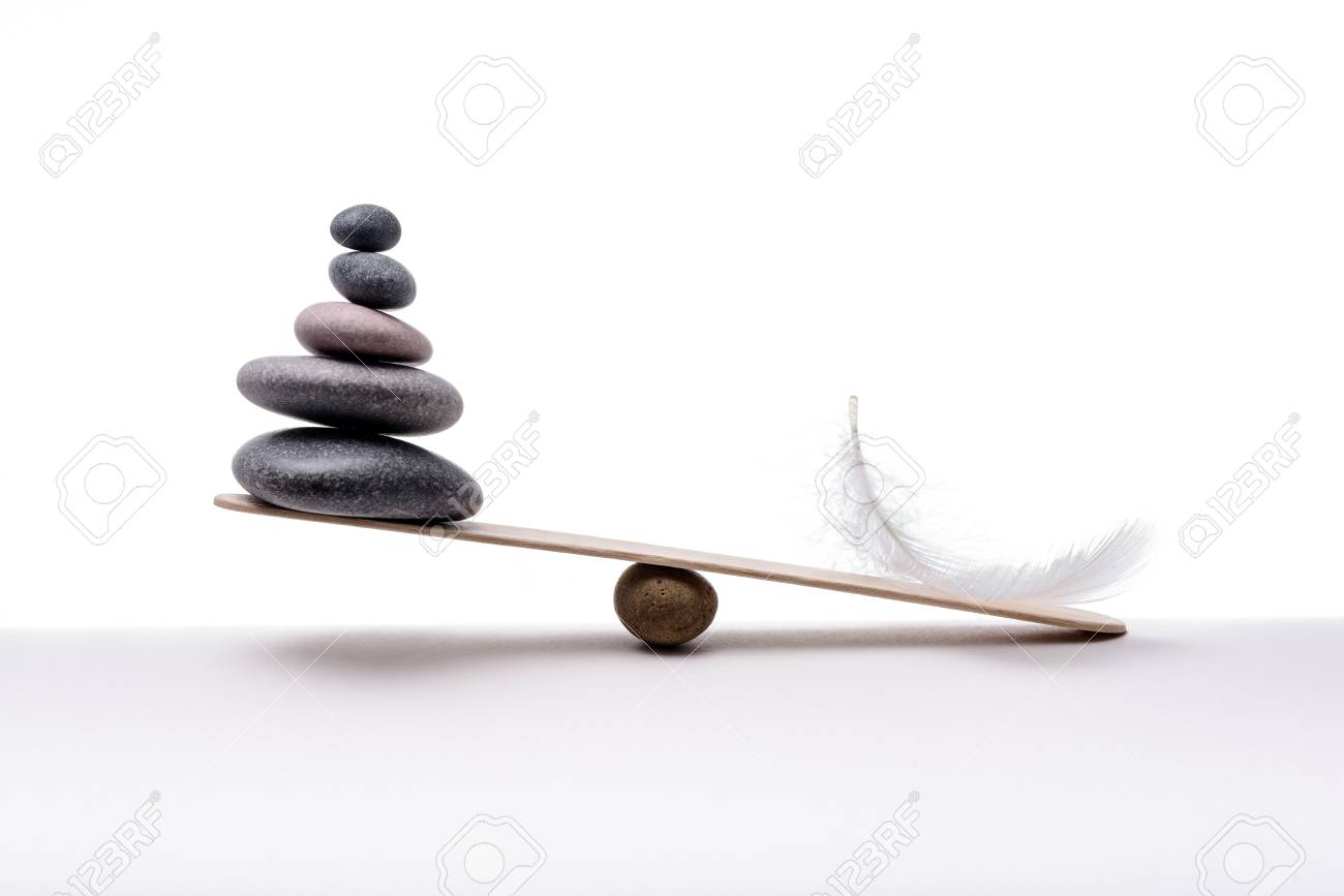 Stone balance with plume. Concept of heavy and light. - 95715975 Stone balance with plume. Concept of heavy and light. - 95715975