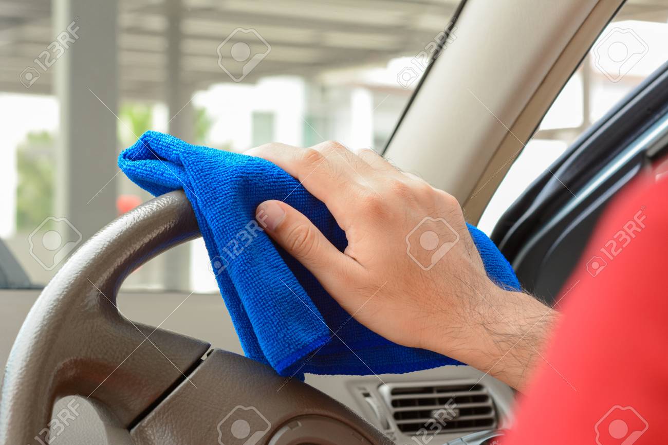 Steering Wheel Cleaner >> Hand Cleaning Car Steering Wheel With Microfiber Cloth Steering Wheel Cleaner >> Hand Cleaning Car Steering Wheel With Microfiber Cloth