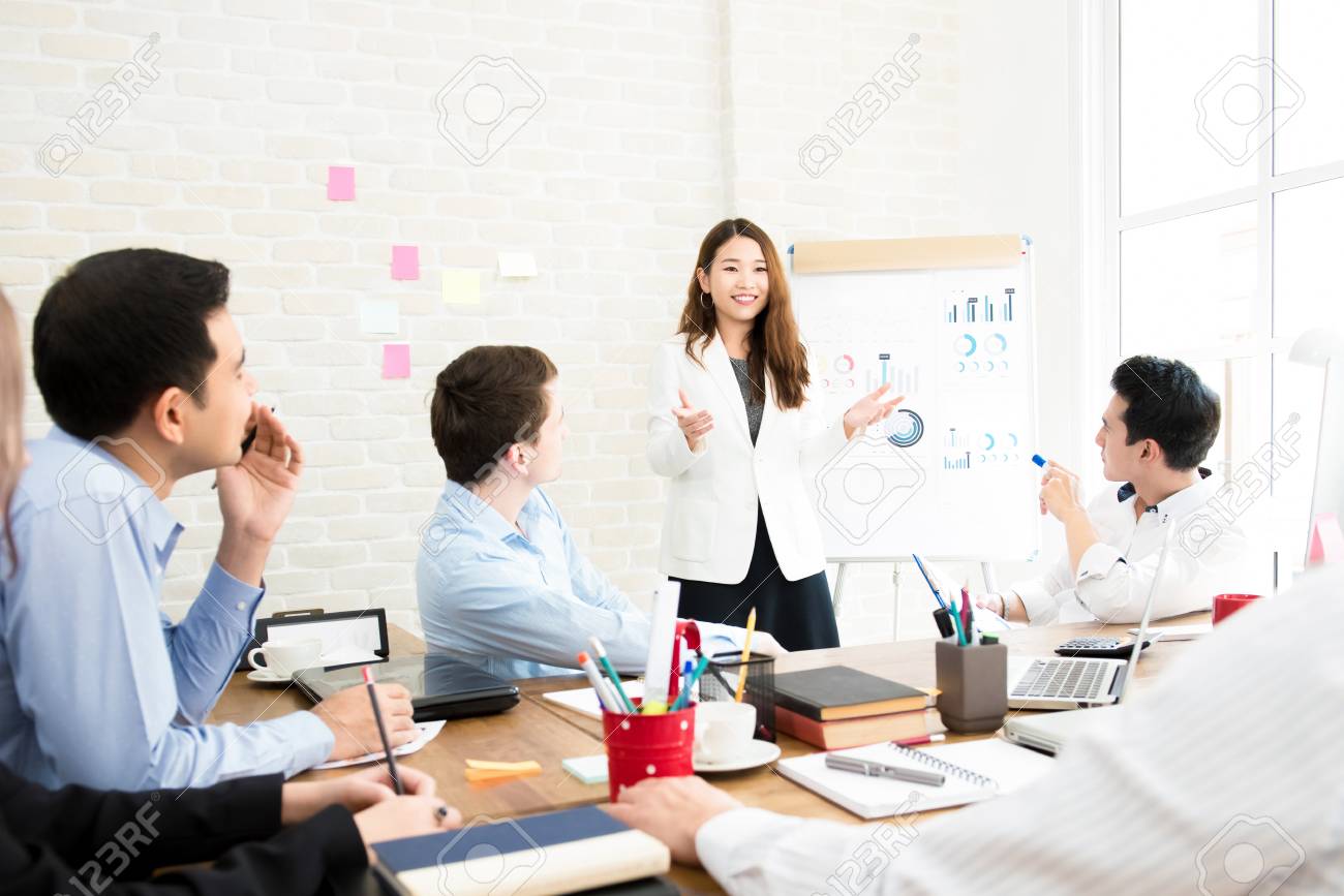 asian business woman leader conducting company sales presentation sales persentation