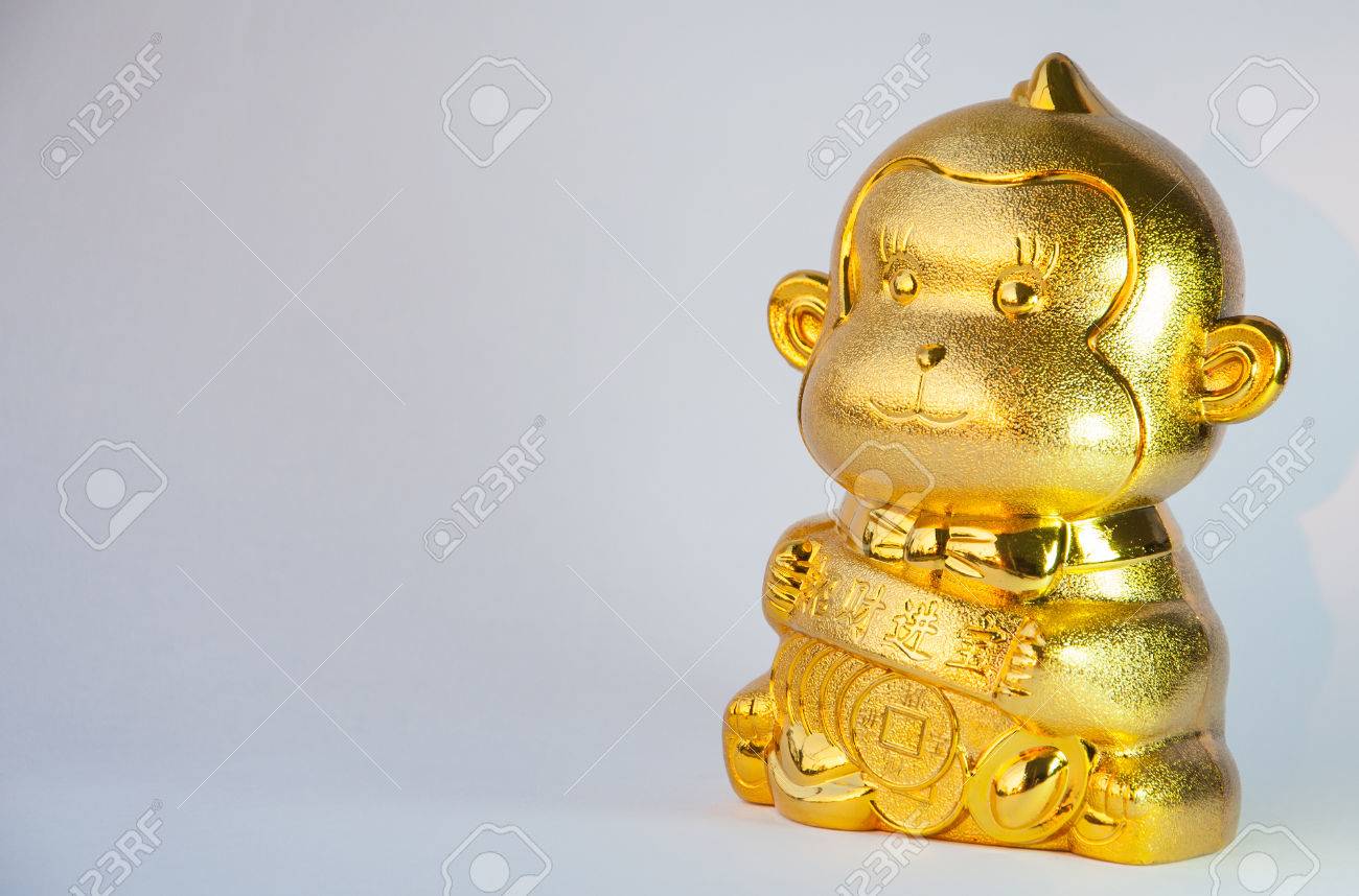 ゴールド コインと中国の旧正月のため有利な中国語の単語の意味の金猿。の写真素材・画像素材 Image 57610735