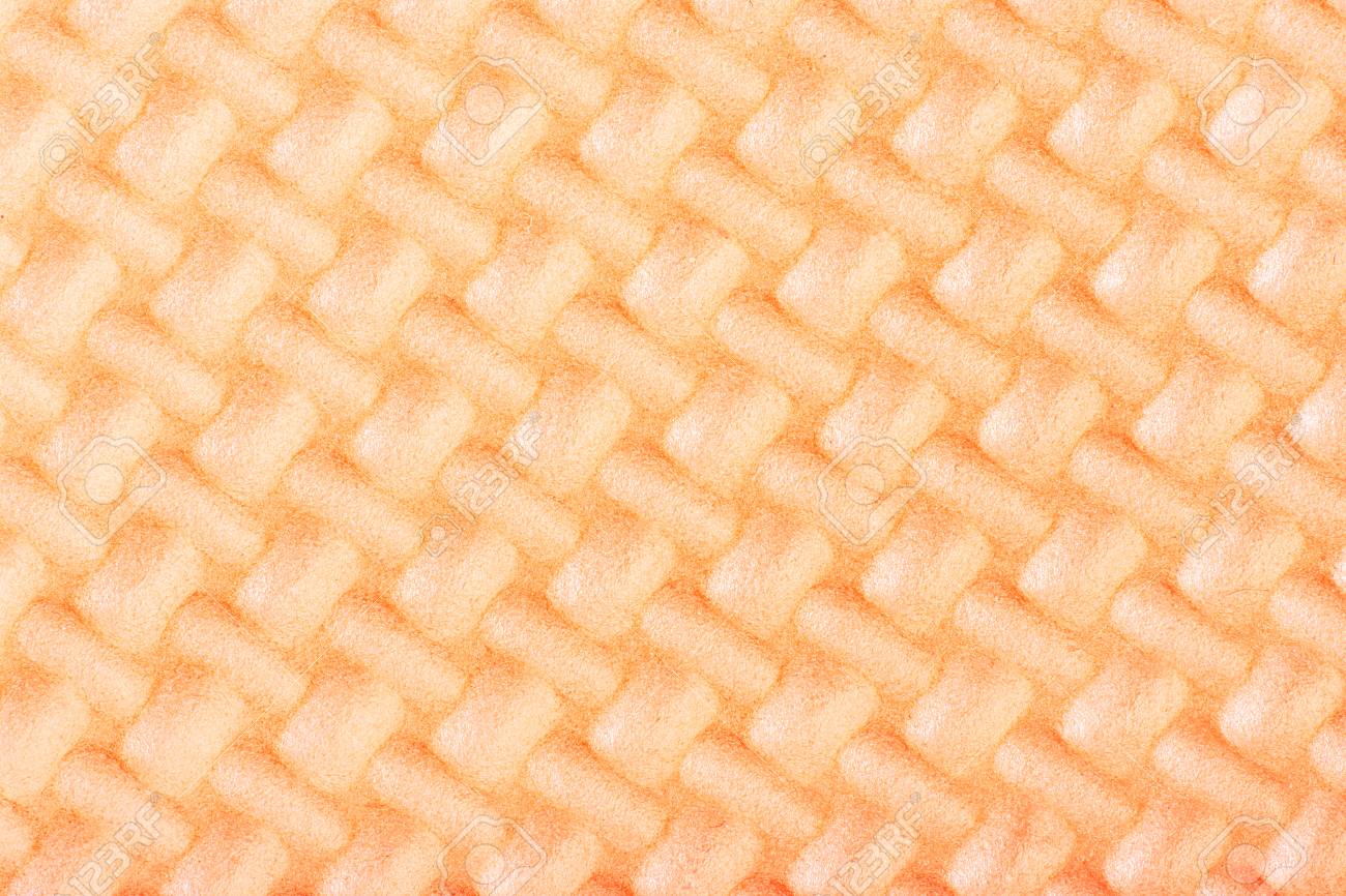 peach colored textured ethylene vinyl acetate closeup stock photo