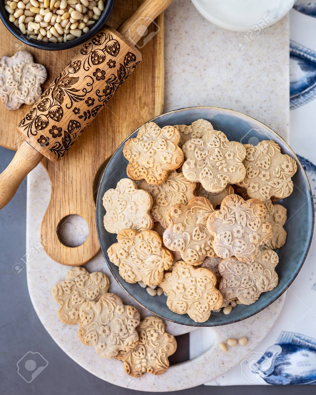 On The Plate Is A Curly Cookie With A Decorative Pattern Made