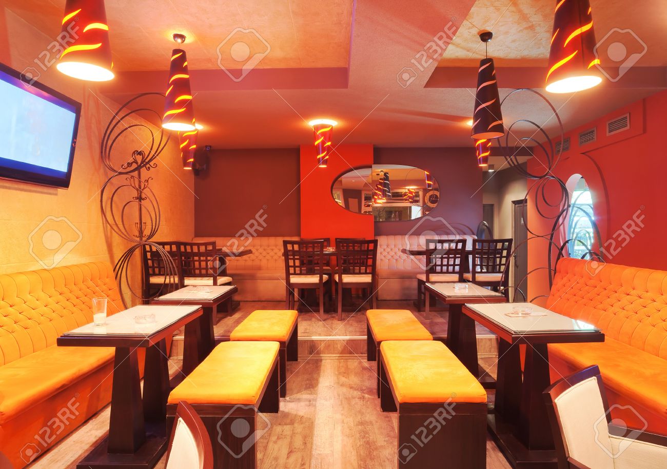 interior of a restaurant, modern design in few colors, orange interior of a restaurant, modern design in few colors, orange