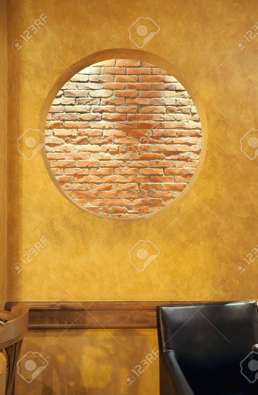interior of a cafe, details of wall design, big round hole in interior of a cafe, details of wall design, big round hole in