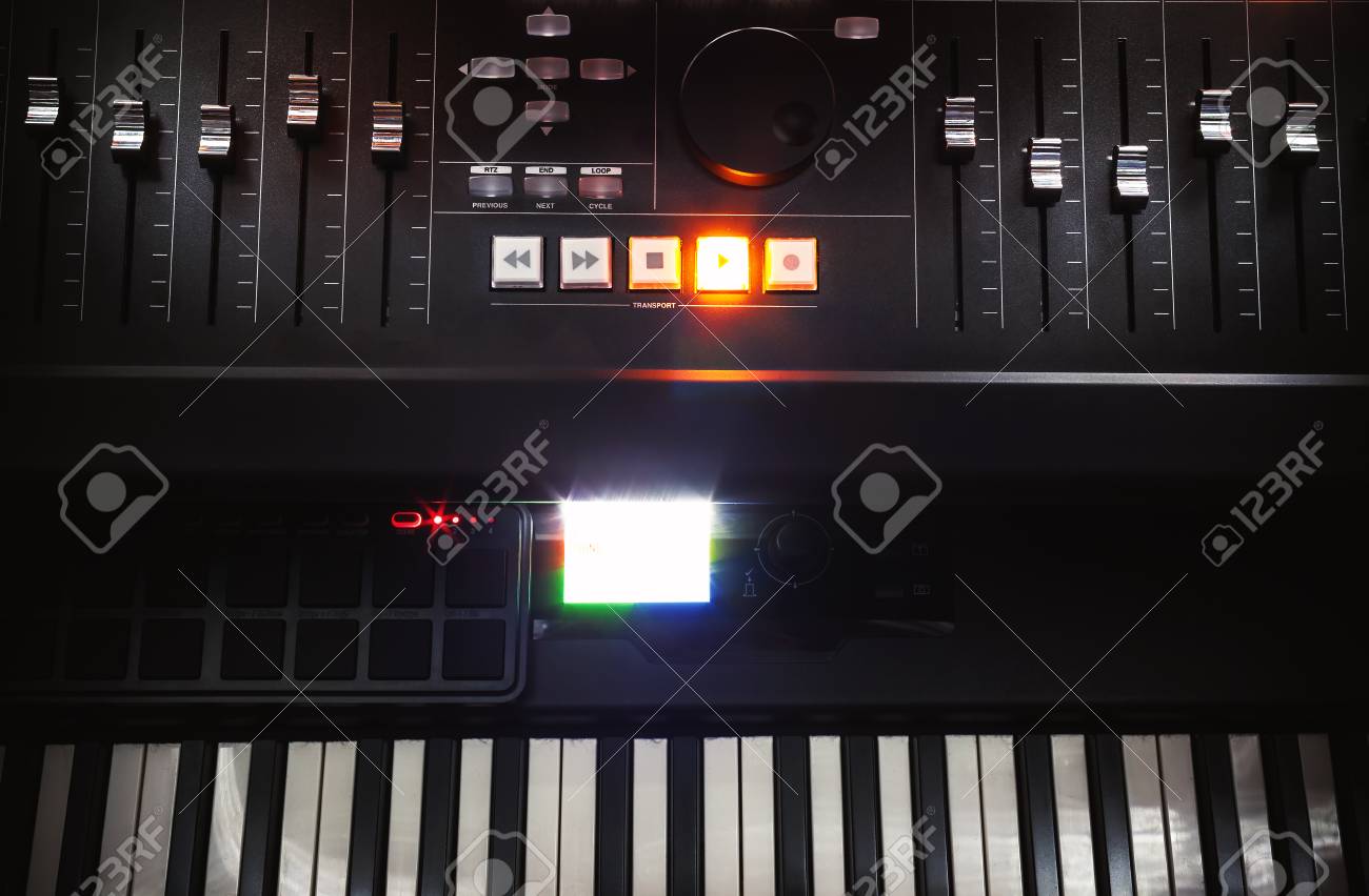 Modern Mixing Console And Piano Keys Small Home Recording Studio
