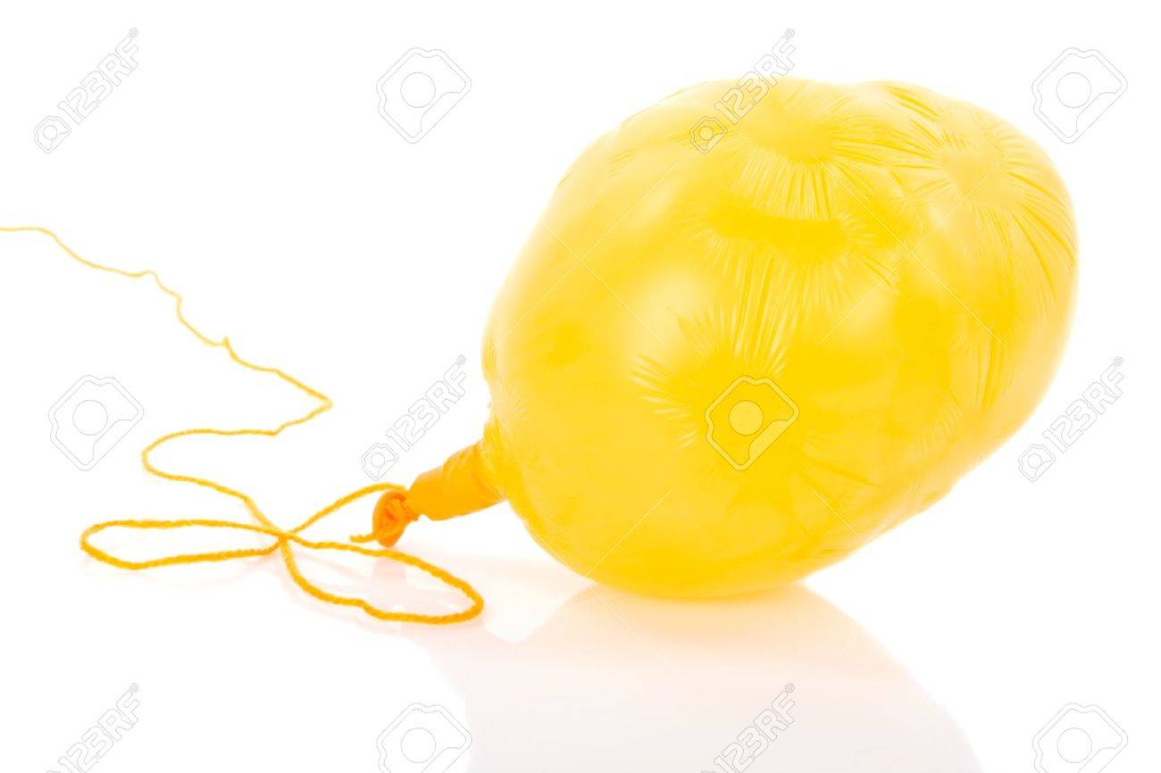 Deflated yellow balloon at a rope; isolated over white - 17745767 Deflated yellow balloon at a rope; isolated over white - 17745767