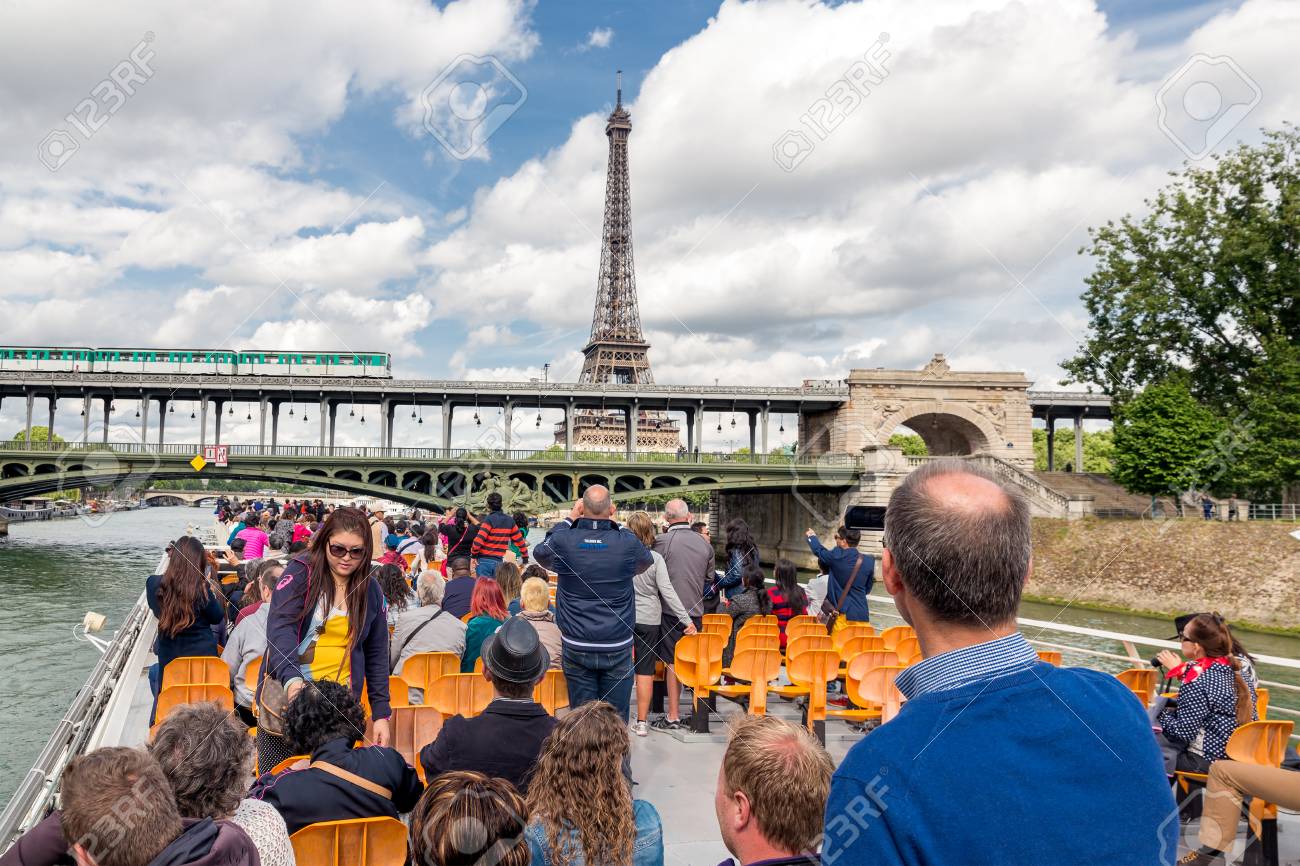 paris france may 28 tourists at a seine river cruise admiring