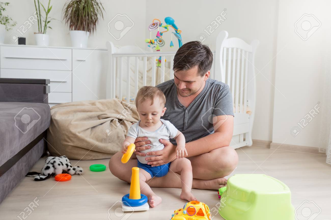 Young Father Playing With His 9 Months Old Baby Boy At Home Stock Photo Picture And Royalty Free Image Image