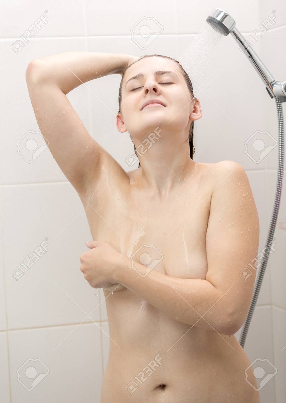 Toned Portrait Of Sexy Naked Woman With Beautiful Body Showering In Bathroom  Stock Photo, Picture and Royalty Free Image. Image 101076690.