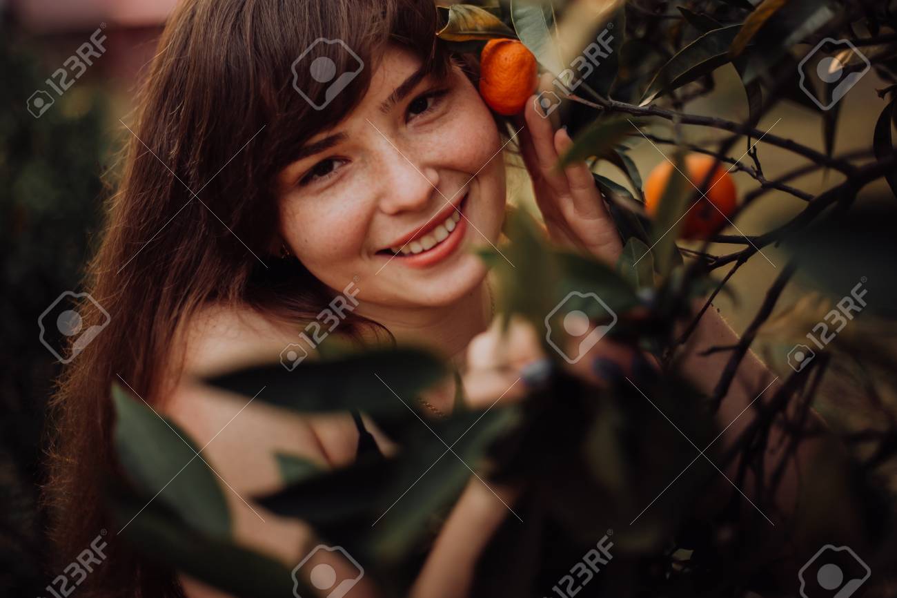 Portrait Of Happy Smiling Trendy Girl With Hairstyle With Red