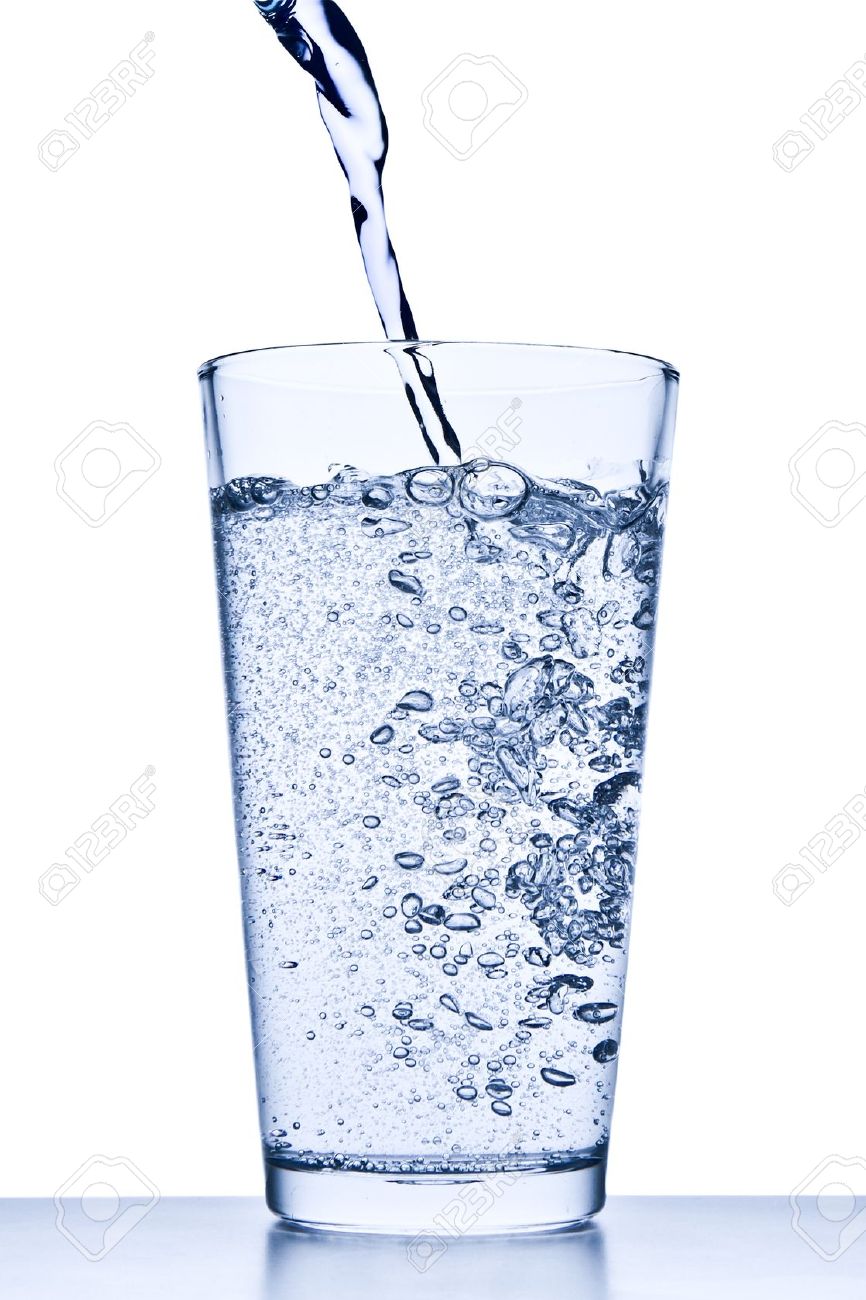 water pouring into glass on white background stock photo picture
