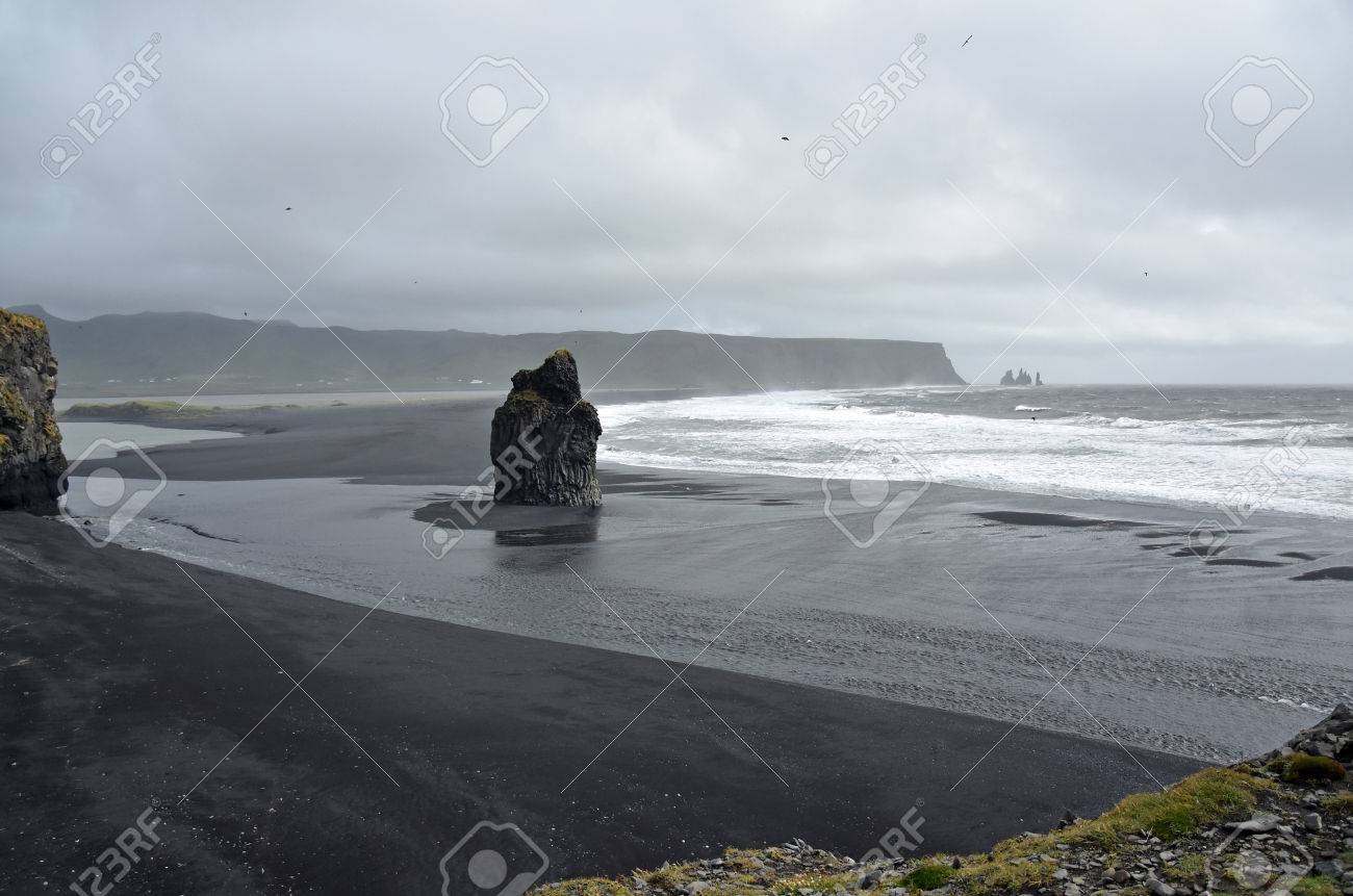 Coastal Scenery At Dyrholaey Iceland A Big Rock Stands Centrally Stock Photo Picture And Royalty Free Image Image Coastal Scenery At Dyrholaey Iceland A Big Rock Stands Centrally Stock Photo Picture And Royalty Free Image Image