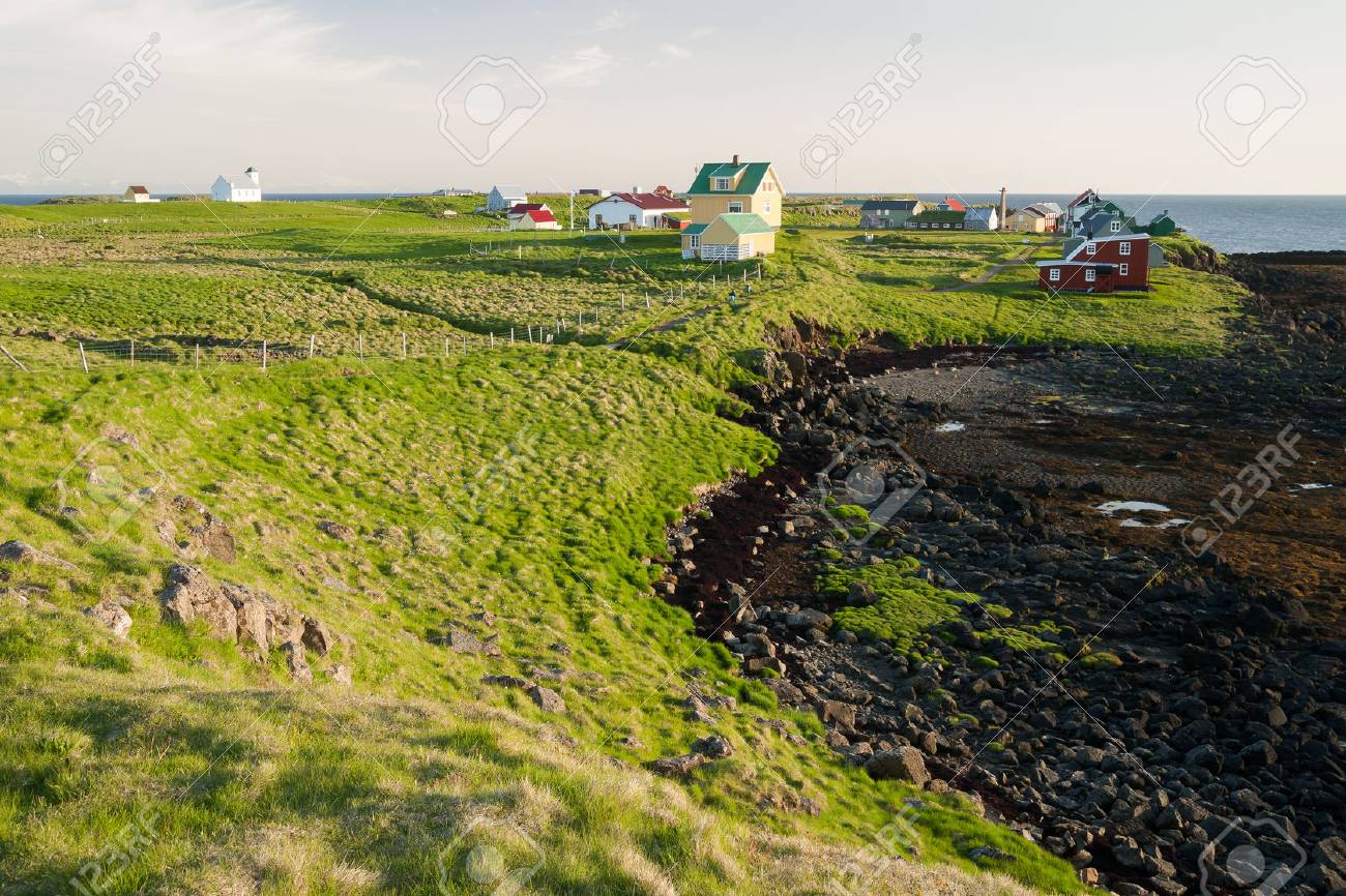 Little houses on Flatey island in Iceland at midnight - 68302878 Little houses on Flatey island in Iceland at midnight - 68302878