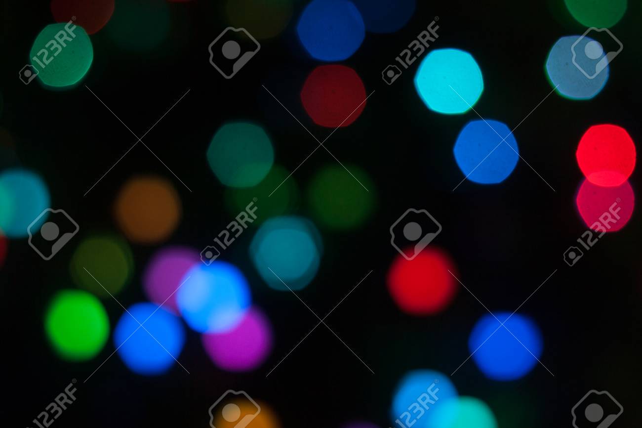 abstract background of out of focus lights at night light hexagon