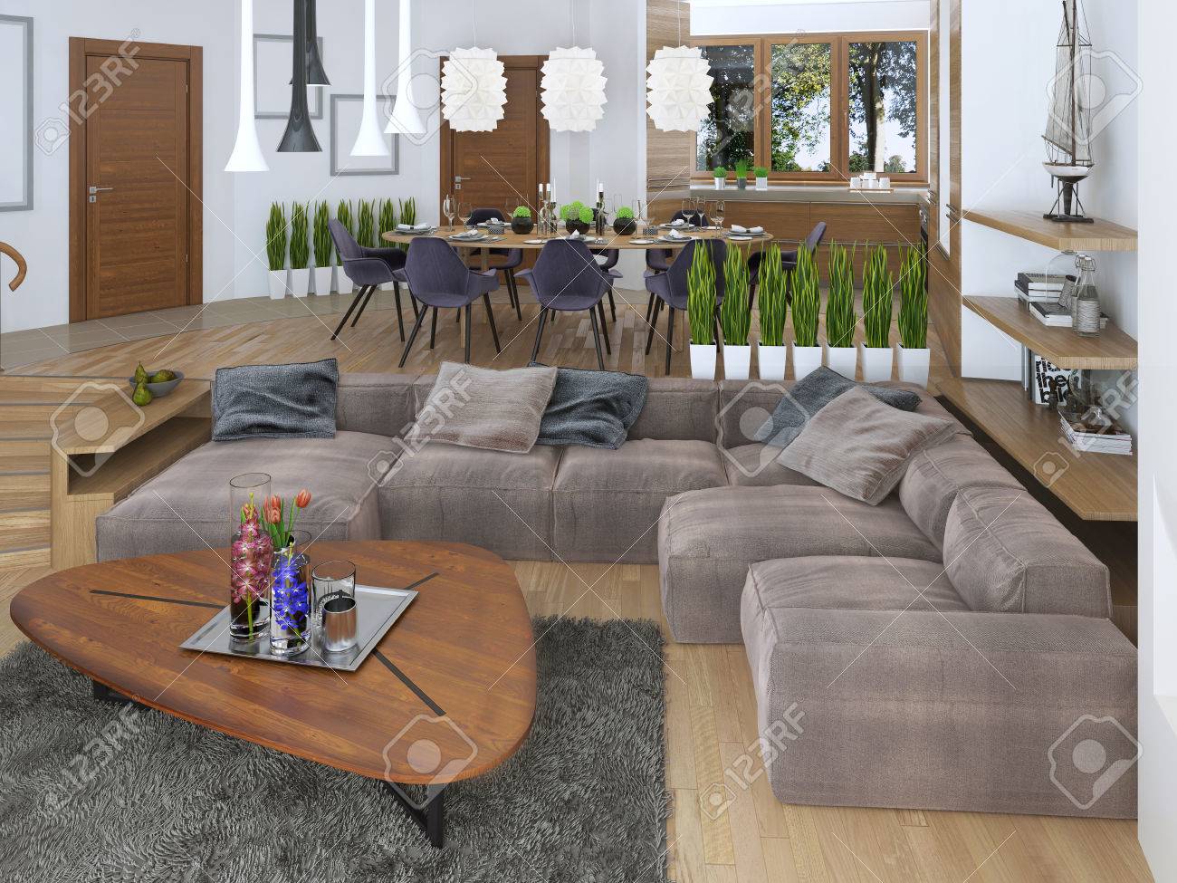 Salon moderne dans un style loft, mélangeant harmonieusement dans la cuisine salle à manger. Grand canapé d'angle, des étagères avec des décorations, Salon moderne dans un style loft, mélangeant harmonieusement dans la cuisine salle à manger. Grand canapé d'angle, des étagères avec des décorations,