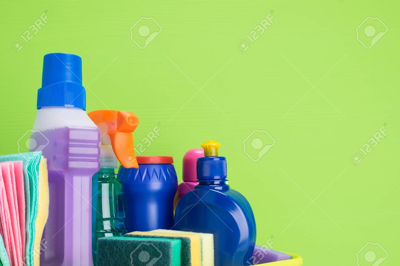 set of liquid and powder products and items for cleaning indoors on a green background, a place for an inscription - 116857089 set of liquid and powder products and items for cleaning indoors on a green background, a place for an inscription - 116857089