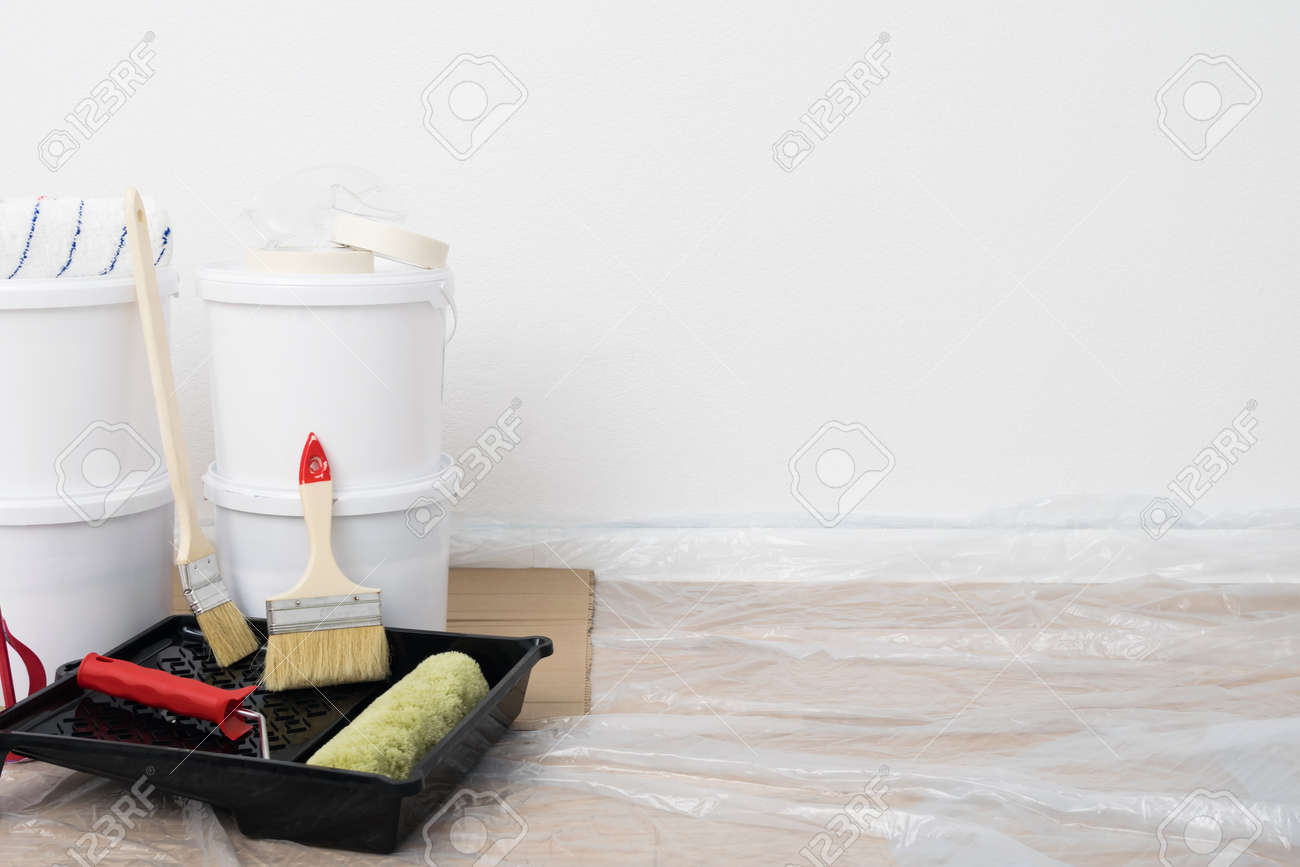 a set of tools and finishing materials for the renovation of premises, on the right is a place for your inscription - 170101562 a set of tools and finishing materials for the renovation of premises, on the right is a place for your inscription - 170101562