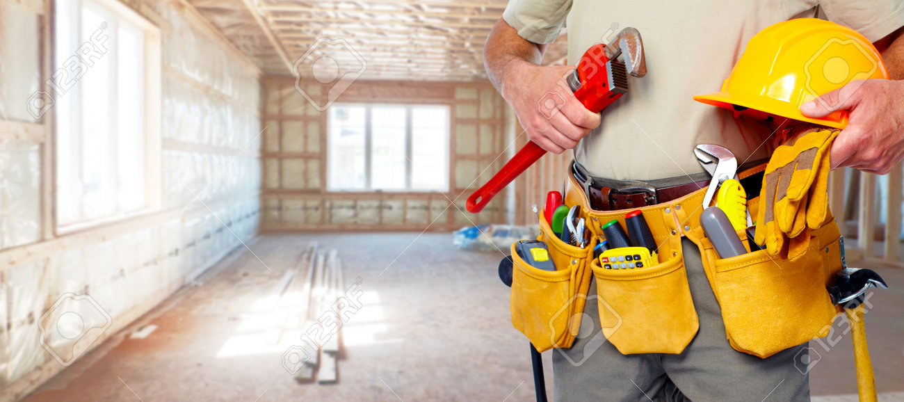 builder handyman with construction tools stock photo picture and
