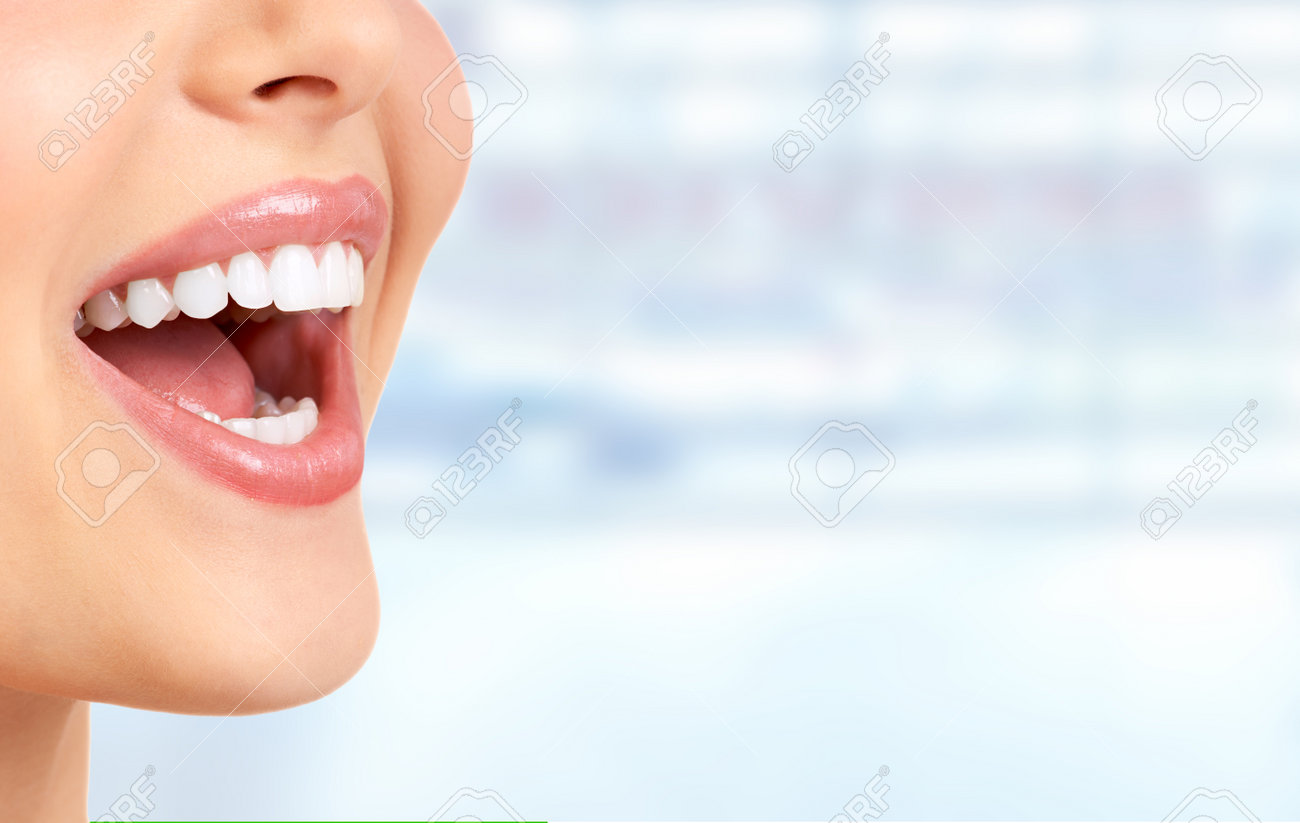 Laughing woman mouth with great teeth over blue background. - 45541917 Laughing woman mouth with great teeth over blue background. - 45541917